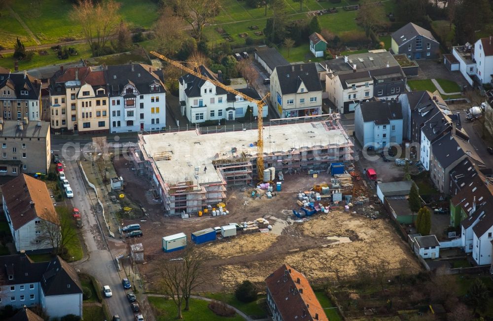 Bochum from the bird's eye view: Construction site for the new building of the seniors residence from the investor Belia GmbH beneath the roads Vorm Gruthoff und Auf dem Dahlacker and surrounding residential houses in Bochum in the state North Rhine-Westphalia