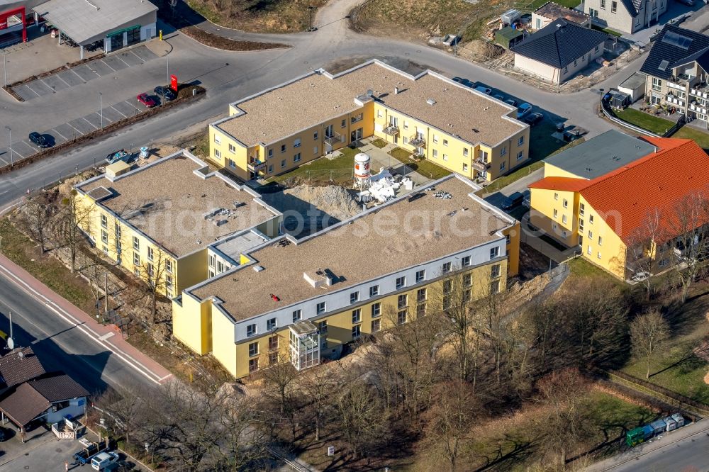 Aerial photograph Bönen - Construction site of a new build retirement home Seniorenhaus Boenen of Zentrale Verwaltungs- and Dienstleistungen fuer Pflegeheime OHG on Heinrich-Wieschhoff Strasse in Boenen in the state North Rhine-Westphalia, Germany