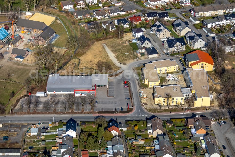 Bönen from above - Construction site of a new build retirement home Seniorenhaus Boenen of Zentrale Verwaltungs- and Dienstleistungen fuer Pflegeheime OHG on Heinrich-Wieschhoff Strasse in Boenen in the state North Rhine-Westphalia, Germany