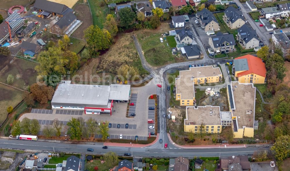 Bönen from the bird's eye view: Construction site of a new build retirement home Seniorenhaus Boenen of Zentrale Verwaltungs- and Dienstleistungen fuer Pflegeheime OHG on Heinrich-Wieschhoff Strasse in Boenen in the state North Rhine-Westphalia, Germany