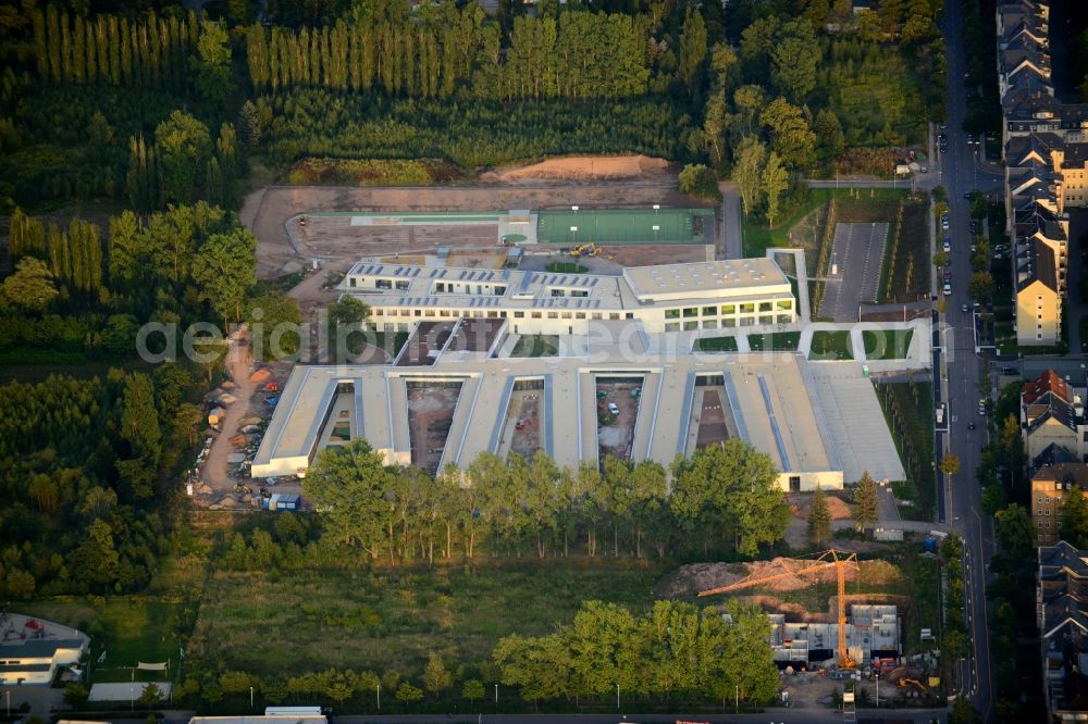 Aerial image Chemnitz - Construction site for the new building of a center for special needs education KOE in Chemnitz in the state of Saxony. The building complex on Heinrich-Schuetz-Strasse was designed by Daehne Architects