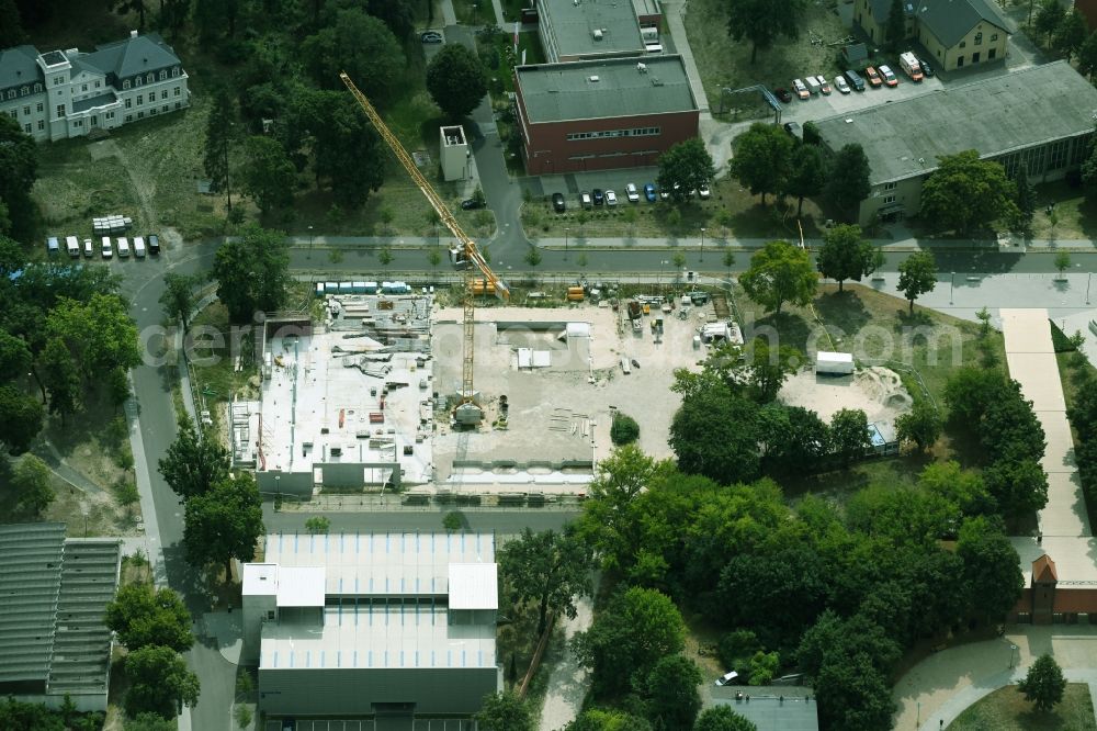 Potsdam from above - Construction site for the new sports hall on corner Olympischer Weg in Potsdam in the state Brandenburg, Germany