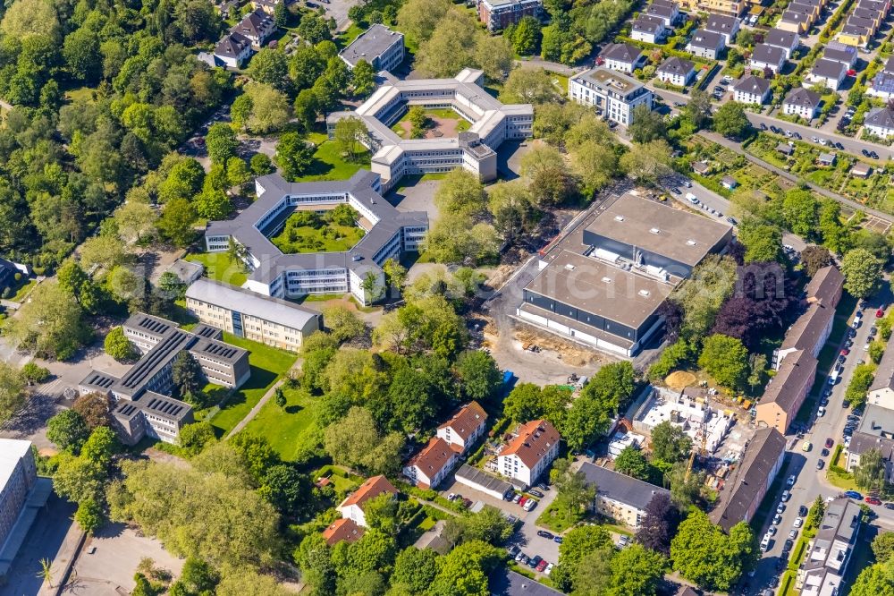 Dortmund from the bird's eye view: Construction site for the new sports hall on Kuithanstrasse at the Kreuzstrasse school center in Dortmund at Ruhrgebiet in the state North Rhine-Westphalia, Germany