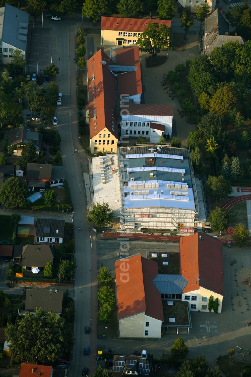 Fredersdorf-Vogelsdorf from the bird's eye view: Construction site for the new sports hall on Tieckstrasse in Fredersdorf-Vogelsdorf in the state Brandenburg, Germany