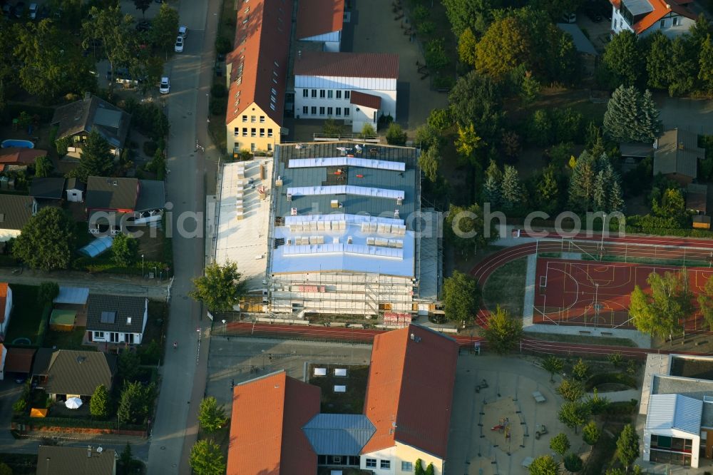 Aerial photograph Fredersdorf-Vogelsdorf - Construction site for the new sports hall on Tieckstrasse in Fredersdorf-Vogelsdorf in the state Brandenburg, Germany