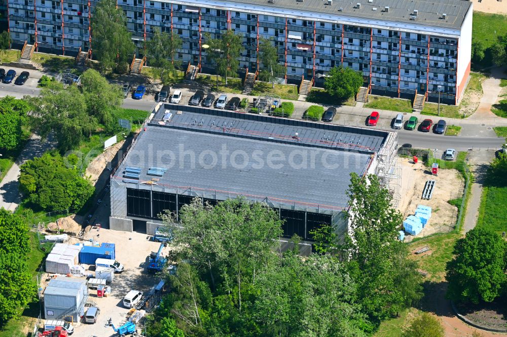 Berlin from the bird's eye view: Construction site for the new sports hall on street Dessauer Strasse in the district Marzahn in Berlin, Germany