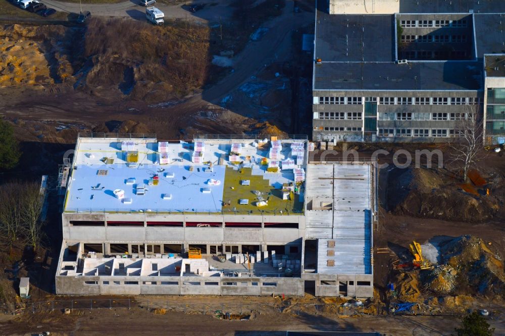 Berlin from above - Construction site for the new sports hall on Poelnitzweg - Wiltbergstrasse in Berlin, Germany