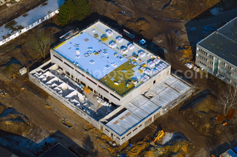 Berlin from the bird's eye view: Construction site for the new sports hall on Poelnitzweg - Wiltbergstrasse in Berlin, Germany