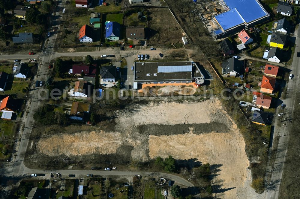 Berlin from above - Construction site for the new sports hall Typensporthalle (TSH) on street Heerstrasse - Bergedorfer Strasse in the district Kaulsdorf in Berlin, Germany