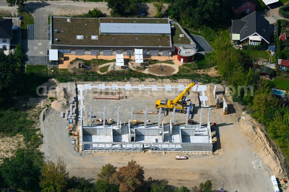 Berlin from the bird's eye view: Construction site for the new sports hall Typensporthalle (TSH) on street Heerstrasse - Bergedorfer Strasse in the district Kaulsdorf in Berlin, Germany