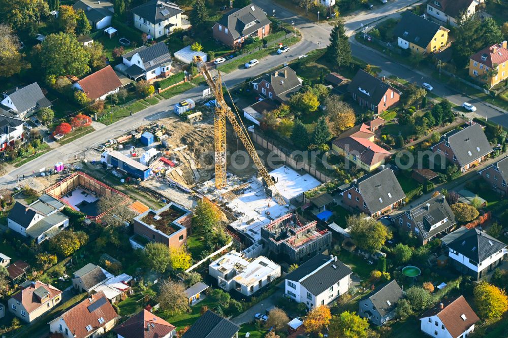 Aerial image Berlin - Construction site for the new construction of a multi-family residential building as a townhouse on street Neuenhagener Strasse in the district Mahlsdorf in Berlin, Germany