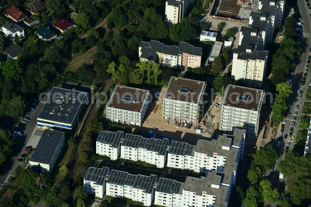 Aerial image Berlin - Construction site for the city villa - multi-family residential building between Zwickauer Damm and Theodor-Loos-Weg in the district Buckow in Berlin, Germany