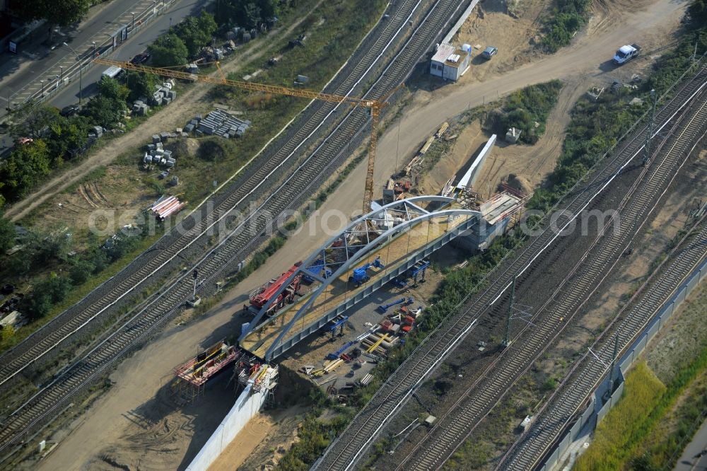 Aerial image Berlin - Construction for the new build of a steel arch bridge at the rail station Ostkreuz in the Berlin, Germany