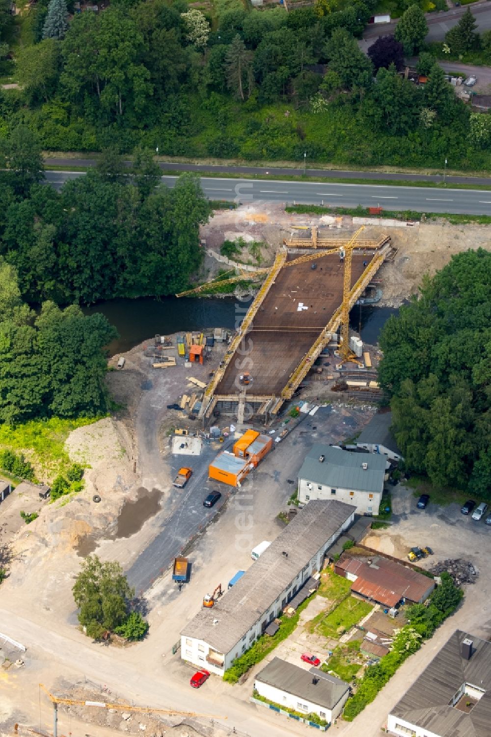 Arnsberg from the bird's eye view: Construction for the new building of the road bridge over the Ruhr at the B229 in Arnsberg in North Rhine-Westphalia