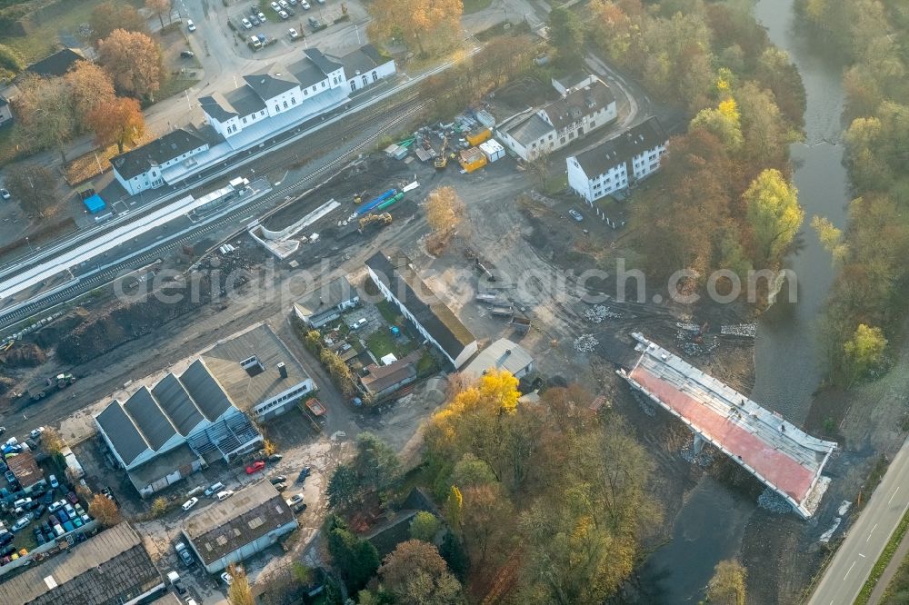 Arnsberg from the bird's eye view: Construction for the new building of the road bridge new Ruhr Bruecke over the Ruhr at the B229 near the train station in Arnsberg in North Rhine-Westphalia