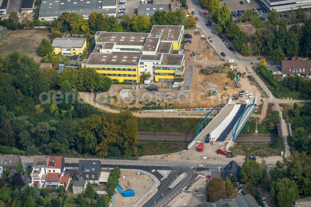 Essen from the bird's eye view: Construction of road bridge Nuenningbruecke between Hubertstrasse and Nuenningstrasse in Essen in the state North Rhine-Westphalia, Germany