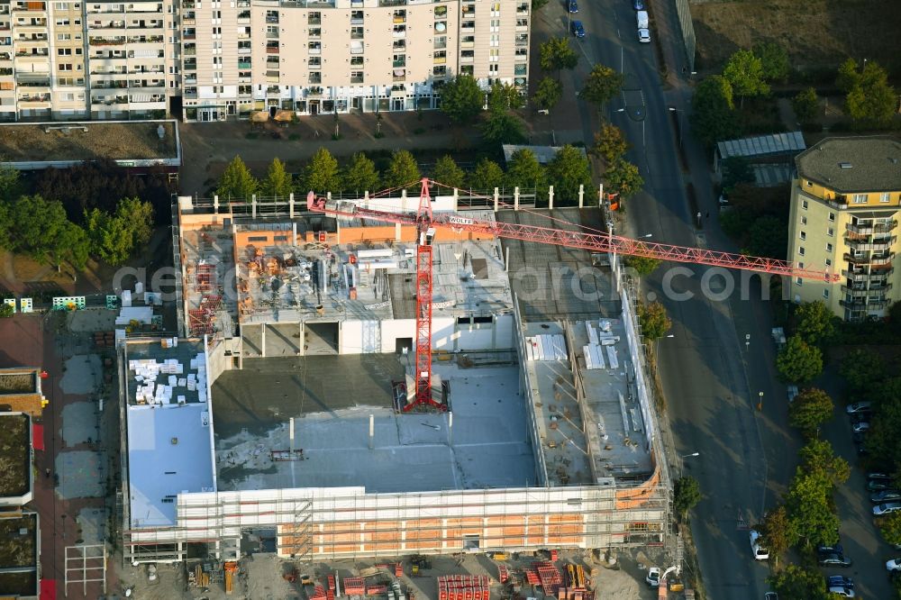 Berlin from the bird's eye view: Construction site for the new building of a supermarket of EDEKA ZENTRALE AG & Co. KG on Siriusstrasse in Berlin, Germany