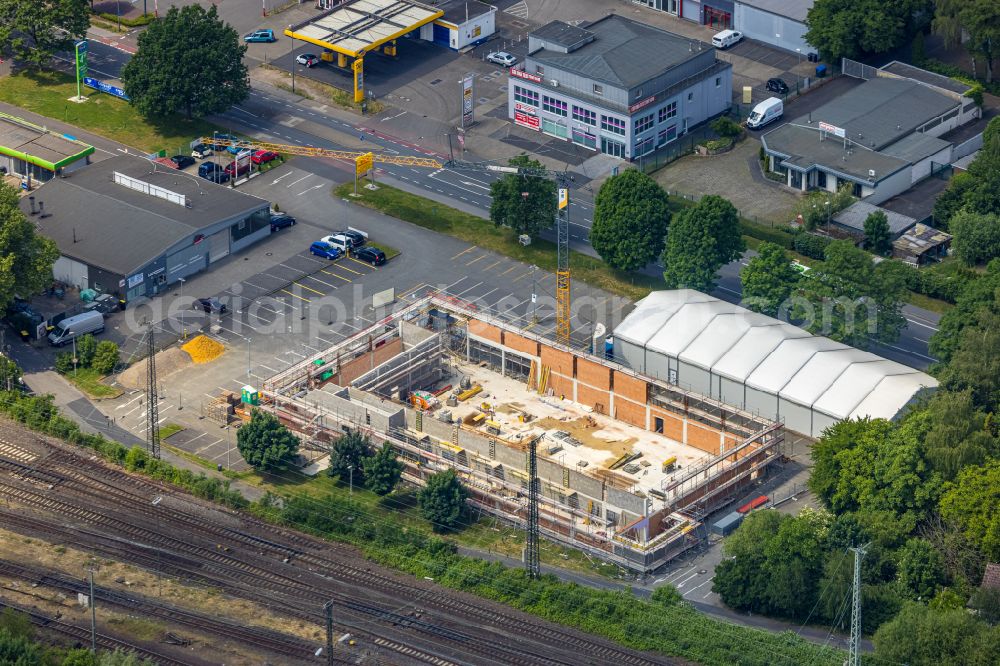 Aerial photograph Herne - Construction site for the new building of a store of the supermarket Netto on Berliner Strasse - Herner Strasse in the district Wanne-Eickel in Herne at Ruhrgebiet in the state North Rhine-Westphalia, Germany