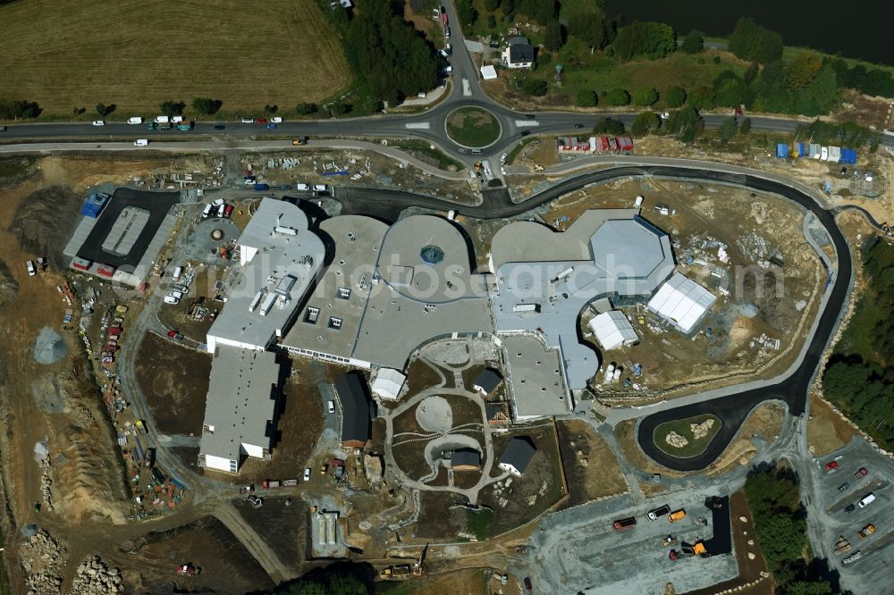 Aerial photograph Weißenstadt - Construction for the new building of the spa and swimming pool at the swimming pool of Recreation Siebenquell(R) GesundZeitResort Kurzentrum Siebenstern GmbH & Co. KG in Weissenstadt in the state Bavaria