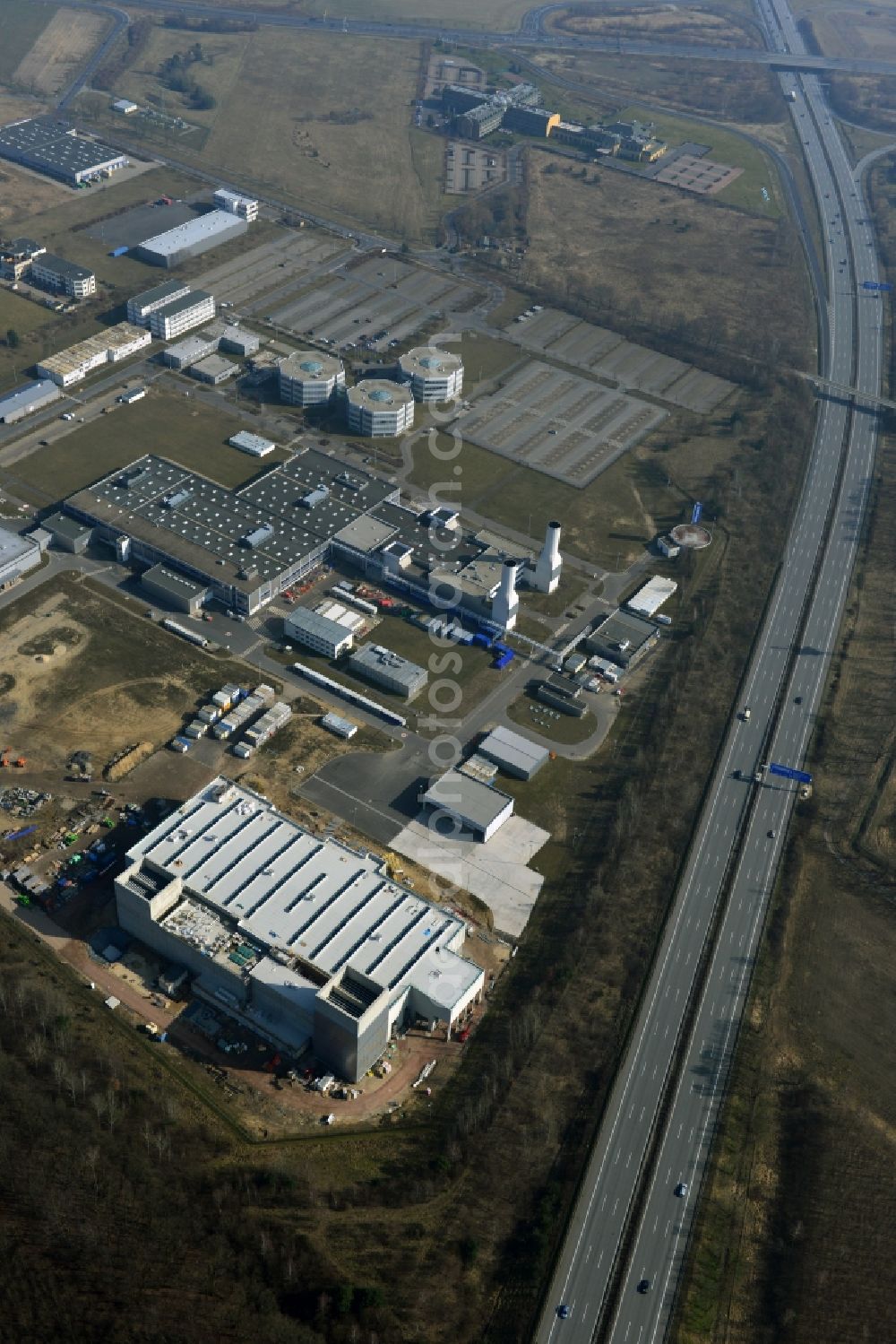 Dahlewitz from above - Construction site to build a new engine test stand at the Rolls Royce plant in Dahlewitz in Brandenburg