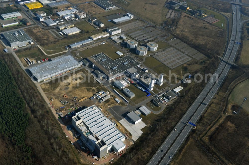 Dahlewitz from the bird's eye view: Construction site to build a new engine test stand at the Rolls Royce plant in Dahlewitz in Brandenburg