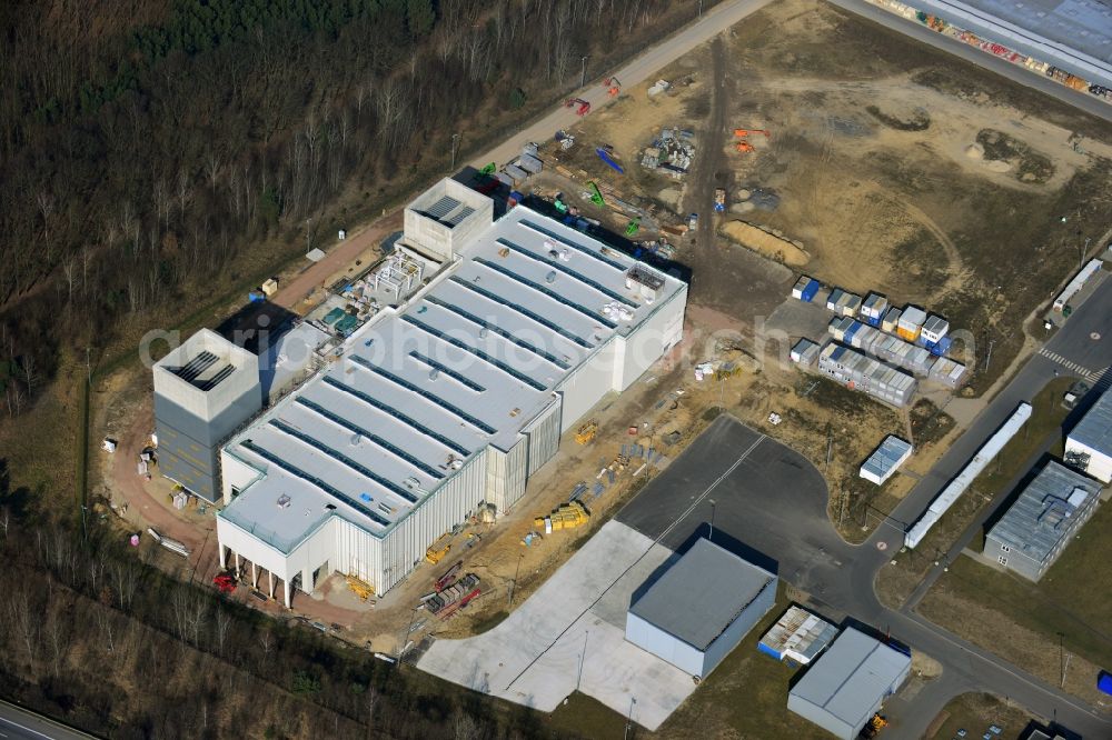 Aerial photograph Dahlewitz - Construction site to build a new engine test stand at the Rolls Royce plant in Dahlewitz in Brandenburg