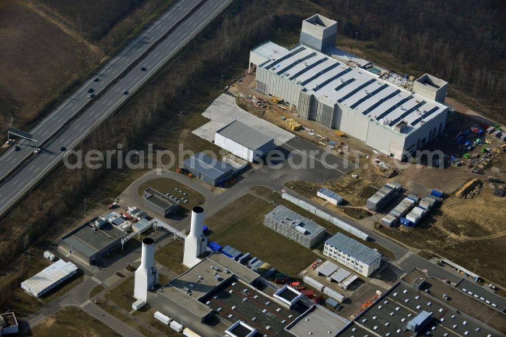 Dahlewitz from the bird's eye view: Construction site to build a new engine test stand at the Rolls Royce plant in Dahlewitz in Brandenburg