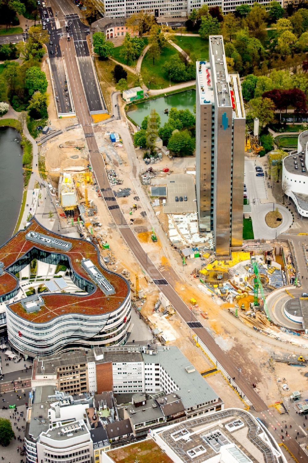 Düsseldorf from the bird's eye view: Construction for the new building of the Koe- tunnel at the skyscraper Dreischeibenhaus along Berliner Allee in Dusseldorf in North Rhine-Westphalia