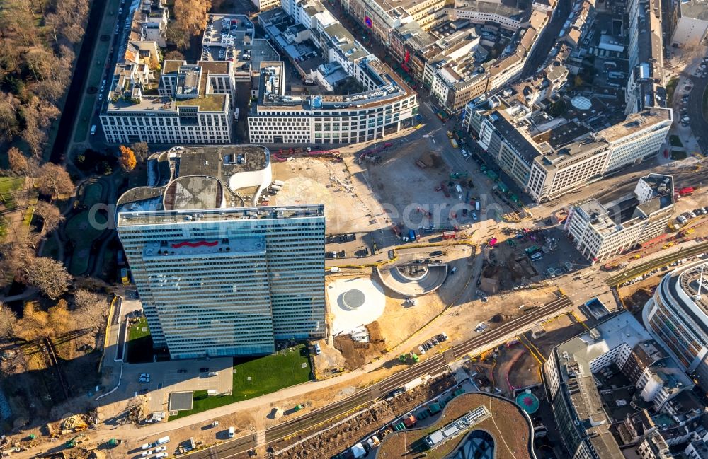 Düsseldorf from the bird's eye view: Construction for the new building of the Koe- tunnel at the skyscraper Dreischeibenhaus along Berliner Allee in Dusseldorf in North Rhine-Westphalia