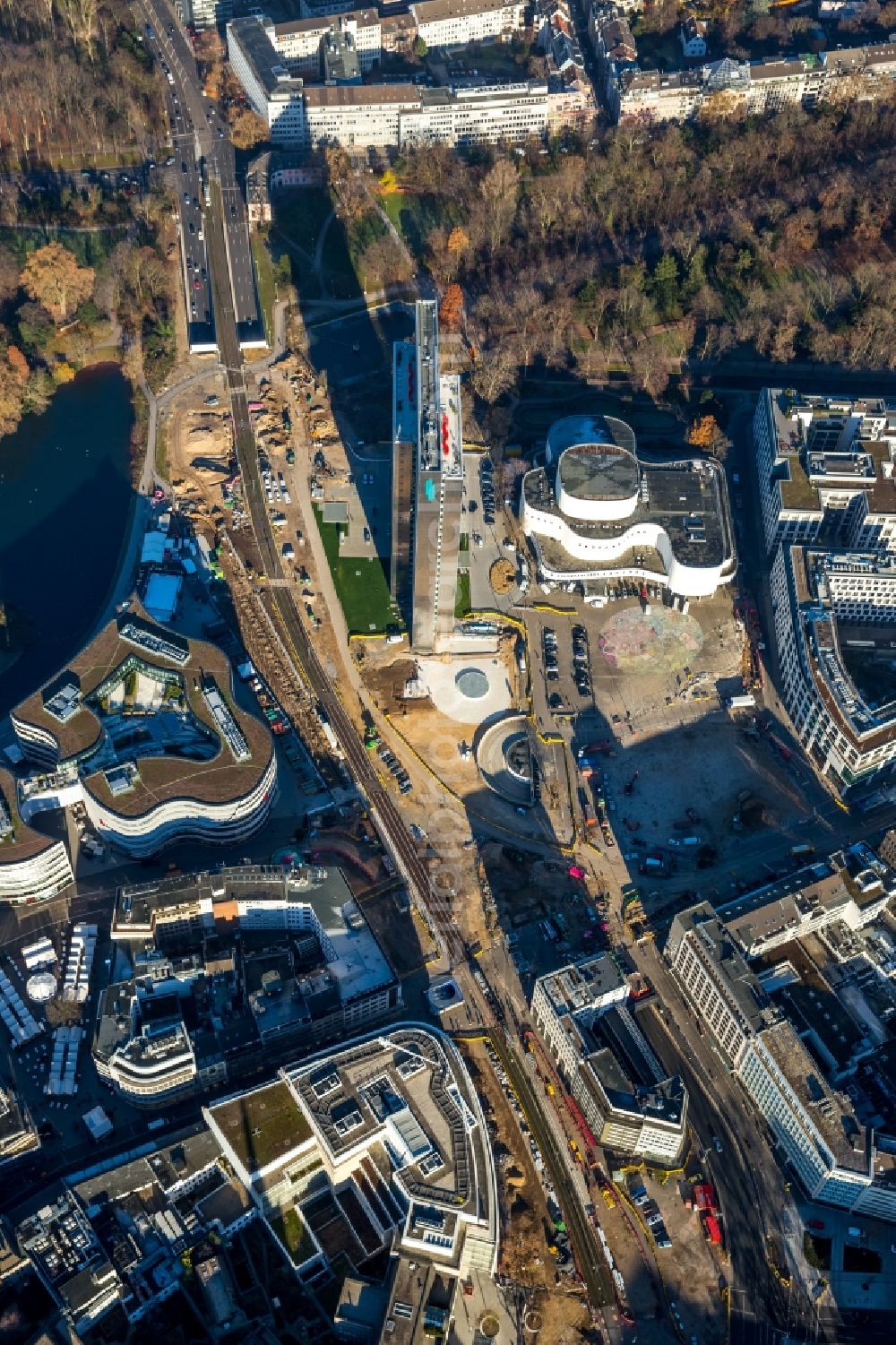 Düsseldorf from the bird's eye view: Construction for the new building of the Koe- tunnel at the skyscraper Dreischeibenhaus along Berliner Allee in Dusseldorf in North Rhine-Westphalia