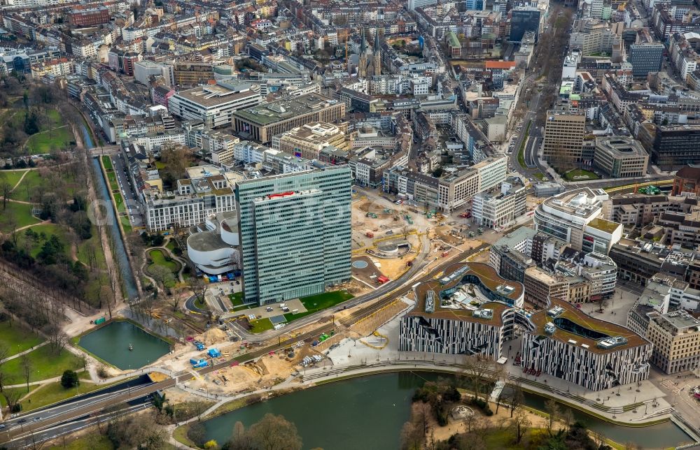 Düsseldorf from the bird's eye view: Construction for the new building of the Koe- tunnel at the skyscraper Dreischeibenhaus along Berliner Allee in Dusseldorf in North Rhine-Westphalia