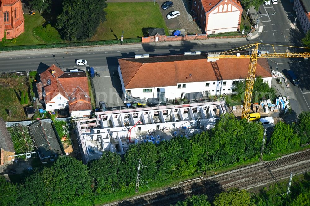 Bernau from the bird's eye view: Construction site for the new building on Ulitzkastrasse in Bernau in the state Brandenburg, Germany