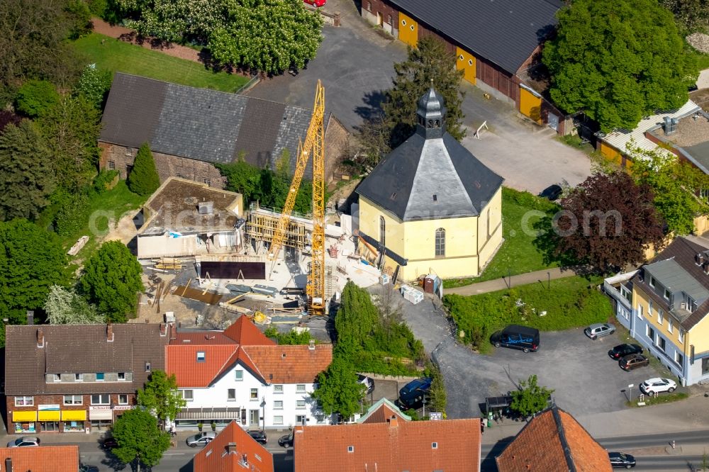 Rhynern from the bird's eye view: Construction site for the new building of Kindergarten on church in Rhynern in the state North Rhine-Westphalia