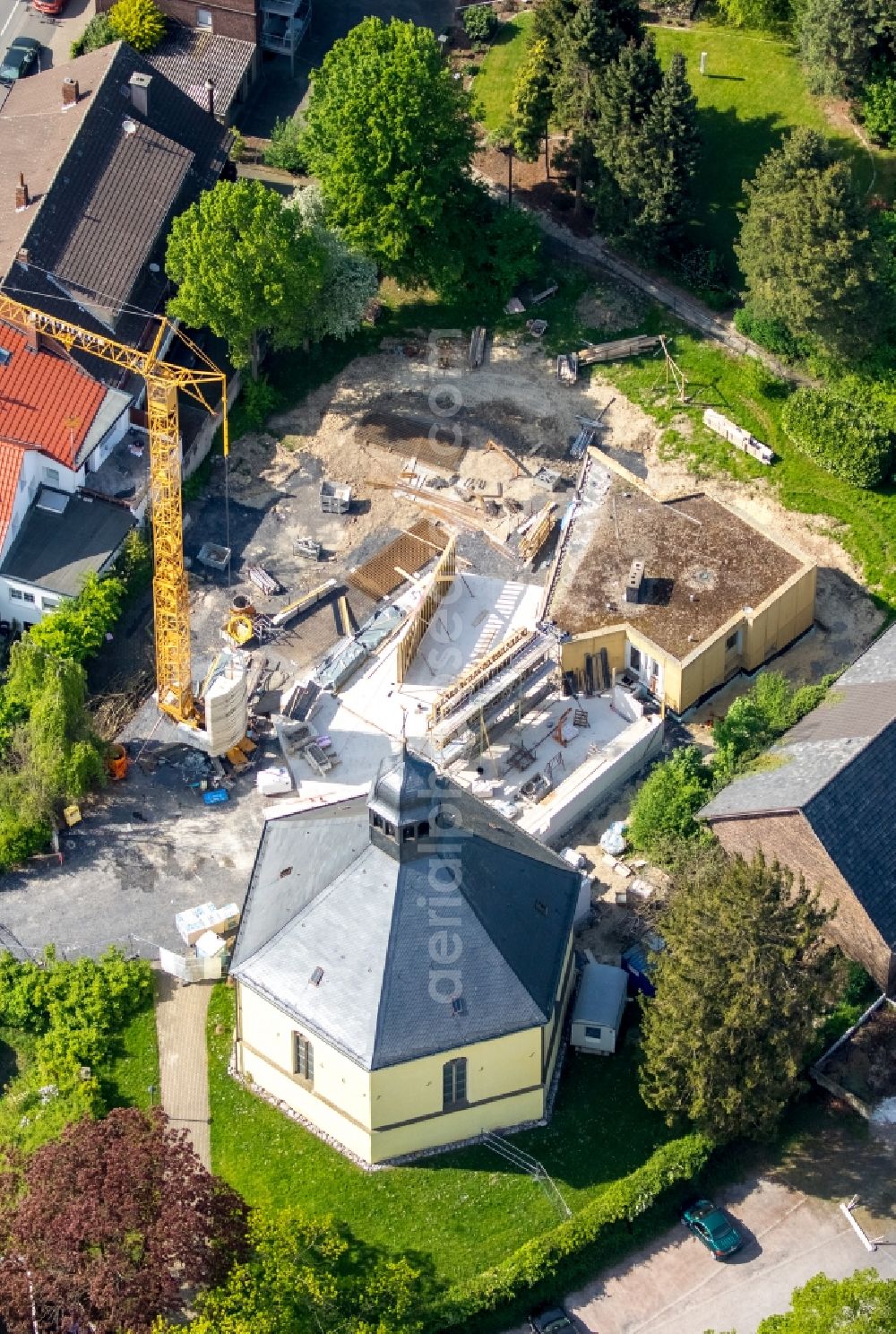 Rhynern from the bird's eye view: Construction site for the new building of Kindergarten on church in Rhynern in the state North Rhine-Westphalia