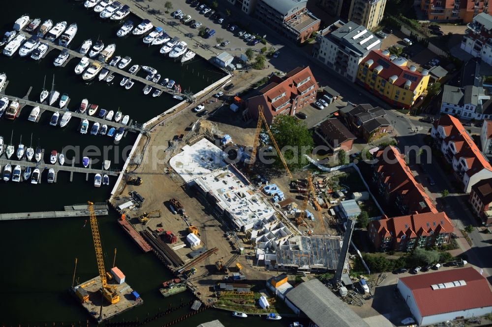 Waren (Müritz) from the bird's eye view: Construction site for the new building and reconstruction of the city port - marina at Mueritz basic in Waren (Mueritz) in the state Mecklenburg - Western Pomerania