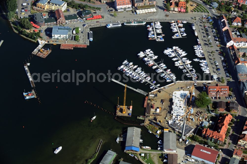 Waren (Müritz) from the bird's eye view: Construction site for the new building and reconstruction of the city port - marina at Mueritz basic in Waren (Mueritz) in the state Mecklenburg - Western Pomerania