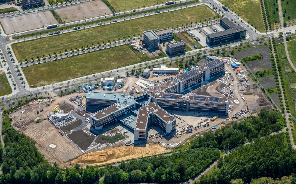 Dortmund from the bird's eye view: New construction of the company administration building AMPRION in Phoenix-West Industriegebiet and TechnologiePark Dortmand in the district Hoerde in Dortmund in the state North Rhine-Westphalia, Germany