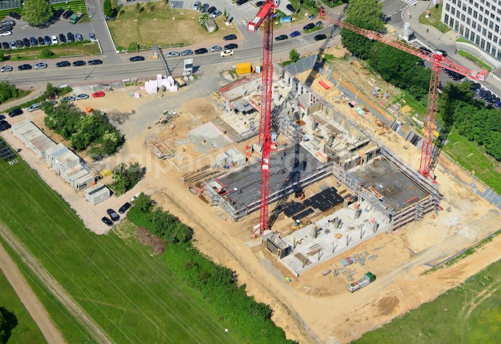 Frankfurt Main from the bird's eye view: View of the construction site to build a new sales and service center of the German Telekom in Eschborn in Frankfurt in Hesse. The building is designed by the architectural firm MEIXNER Schlüter Wendt Architekten with the project developer Lang & Cie.. built by the construction company Adolf Lupp GmbH + Co KG at the Wilhelm-Fay Street