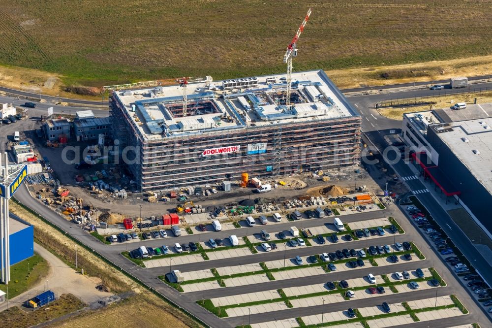 Aerial image Kamen - Construction site for the new construction of an administration building on the site of the new company headquarters of Woolworth GmbH in the industrial area Kamen Karree in Kamen in the state North Rhine-Westphalia, Germany