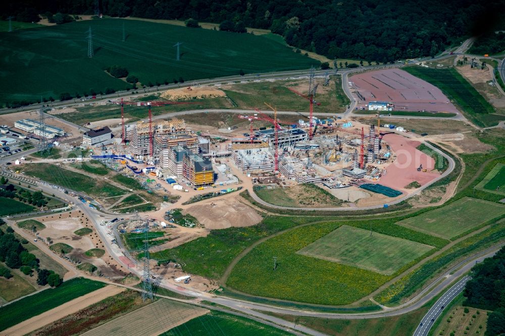 Rust from the bird's eye view: Construction for the new building of the spa and swimming pool at the swimming pool of Recreation Europa-Park in Rust in the state Baden-Wurttemberg