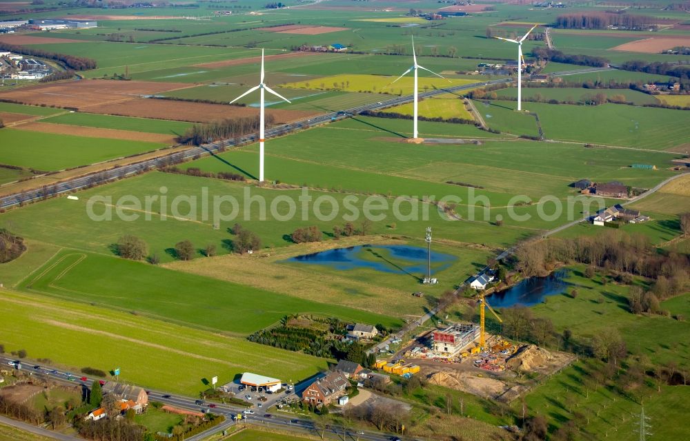 Emmerich am Rhein from above - Construction site for the new building of the waterworks in an agricultural field in Emmerich am Rhein in the state of North Rhine-Westphalia