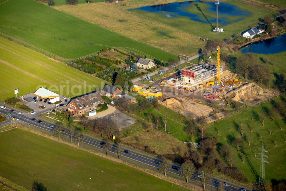 Aerial image Emmerich am Rhein - Construction site for the new building of the waterworks in an agricultural field in Emmerich am Rhein in the state of North Rhine-Westphalia