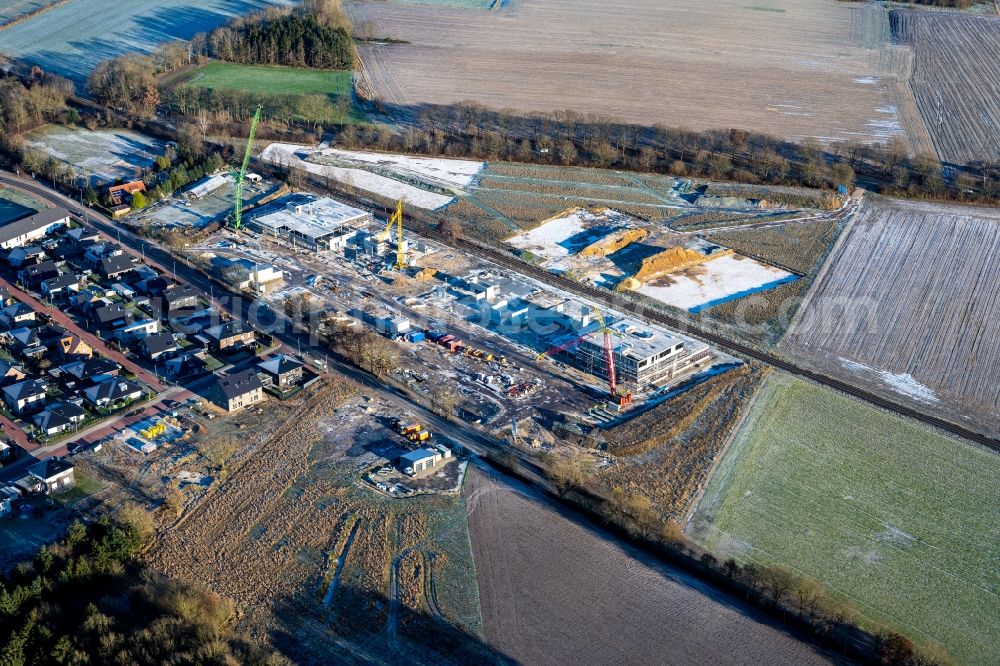 Aerial photograph Stade - Construction site for the new building complex of the education and training center in the district Riensfoerde in Stade in the state Lower Saxony, Germany