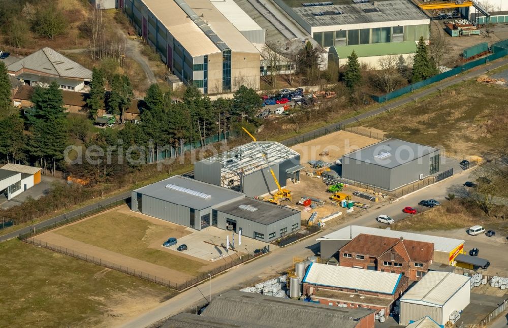 Dorsten from above - Construction site for the new building of factorysgelaenof of PL-Huftechnik e.K. in the district Hervest in Dorsten in the state North Rhine-Westphalia, Germany