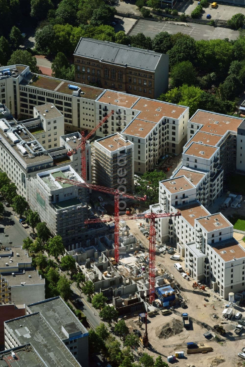 Aerial image Berlin - Construction project for the new construction of residential and office buildings, for example on the northern plot of the Moeckern, corner Stresemannstrasse a 7-storey office building, the housing project Metronome and the residential project Yours from Reggeborgh PE Deutschland GmbH & Co.KG, a residential and commercial building on the adjacent area developed by Kondor Wessels Wohnen Berlin GmbH and a new building of the German Bundeswehr Association e. V. in Berlin, Germany