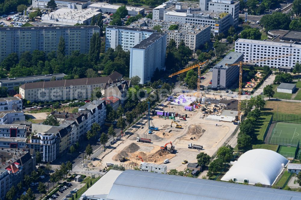 Aerial photograph Berlin - Construction site for the new residential and commercial building on street Konrad-Wolf-Strasse in the district Hohenschoenhausen in Berlin, Germany