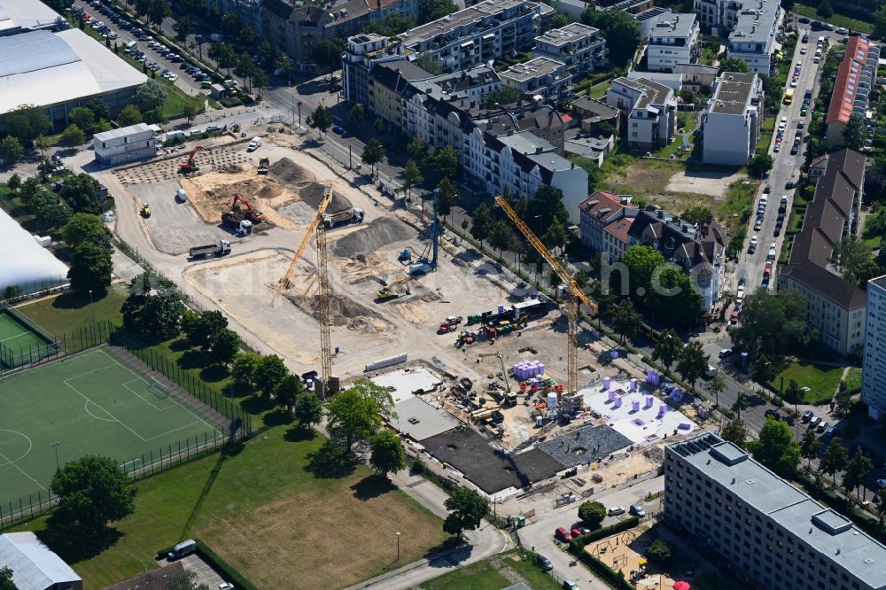Berlin from the bird's eye view: Construction site for the new residential and commercial building on street Konrad-Wolf-Strasse in the district Hohenschoenhausen in Berlin, Germany
