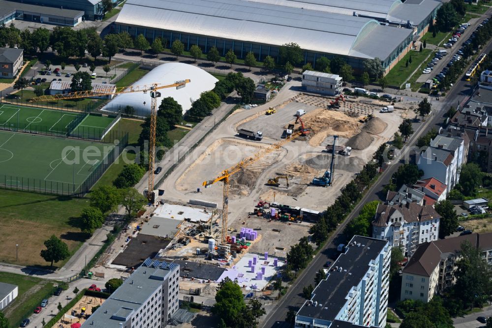 Aerial image Berlin - Construction site for the new residential and commercial building on street Konrad-Wolf-Strasse in the district Hohenschoenhausen in Berlin, Germany