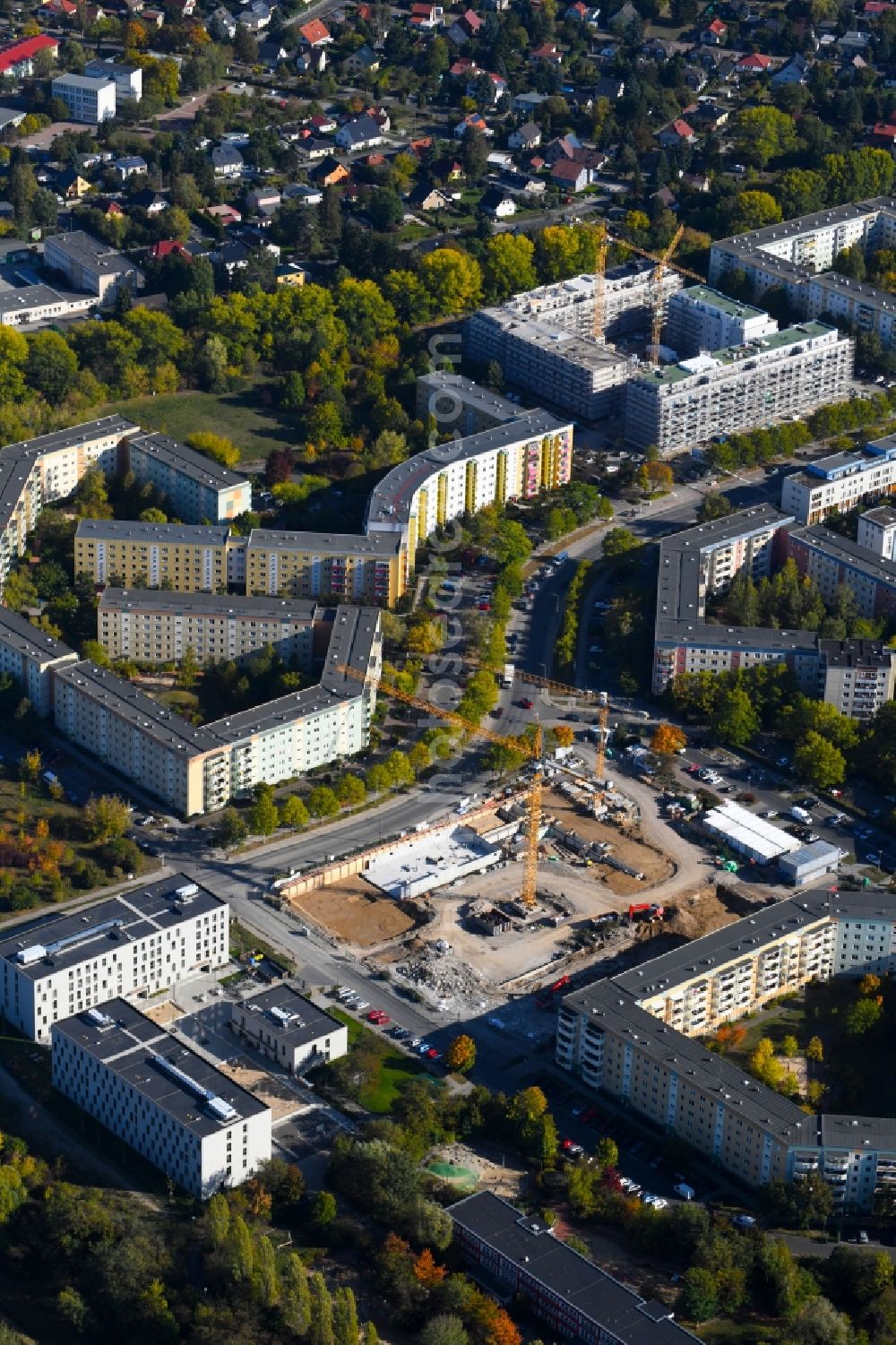 Berlin from the bird's eye view: Construction site for the new residential and commercial building on the Albert-Kuntz-Strasse corner Louis-Lewin-Strasse - Adele-Sandrock-Strasse in the district Hellersdorf in Berlin, Germany