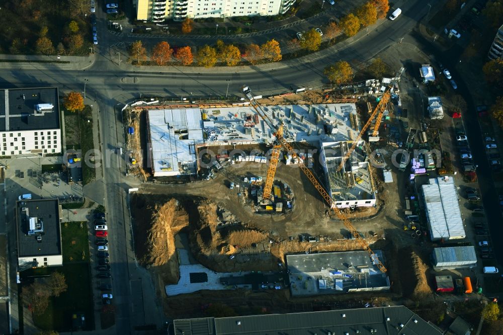 Berlin from above - Construction site for the new residential and commercial building on the Albert-Kuntz-Strasse corner Louis-Lewin-Strasse - Adele-Sandrock-Strasse in the district Hellersdorf in Berlin, Germany